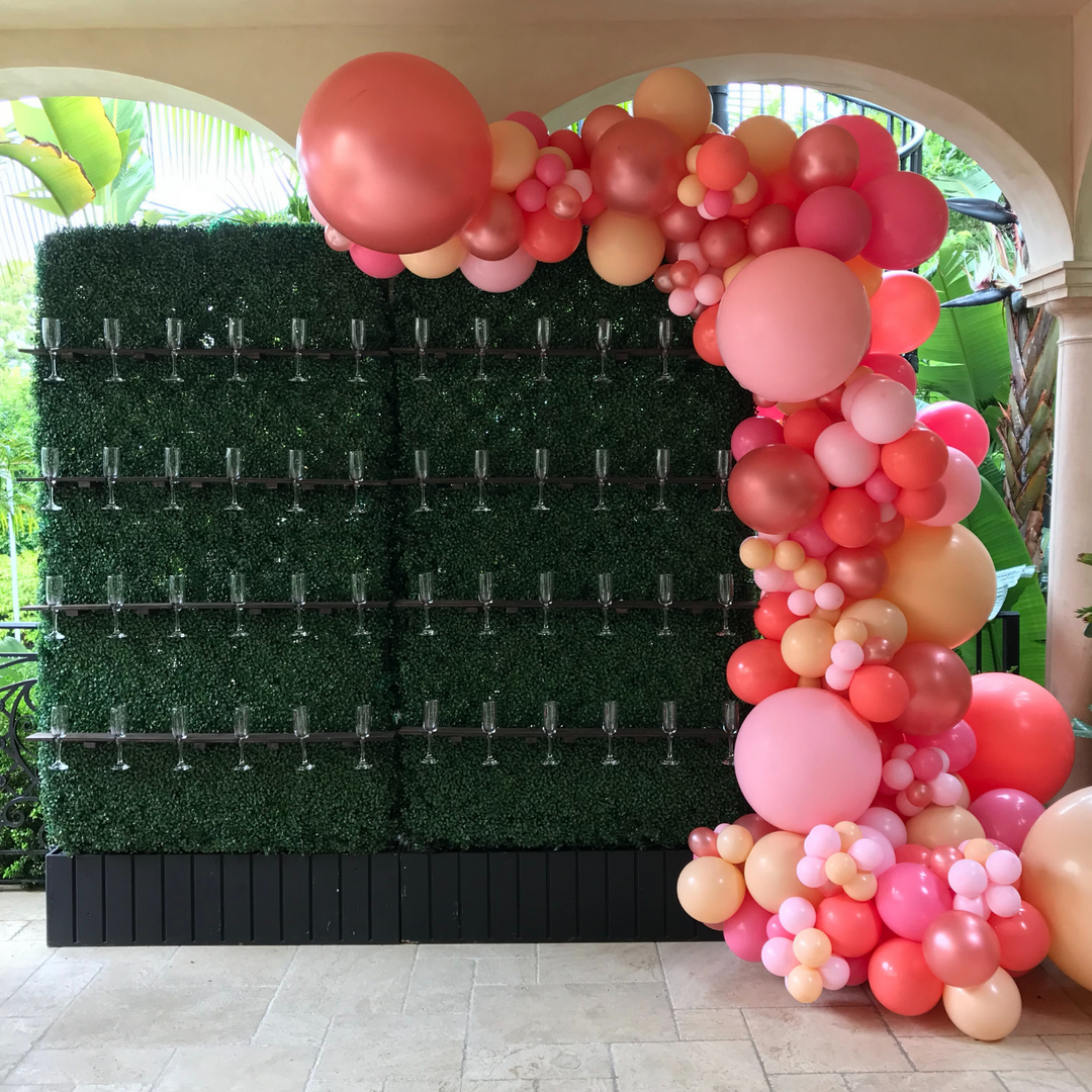 Pink and peach balloon garland with champagne balloon decoration ideas for party backdrop - Los Angeles balloon installation
