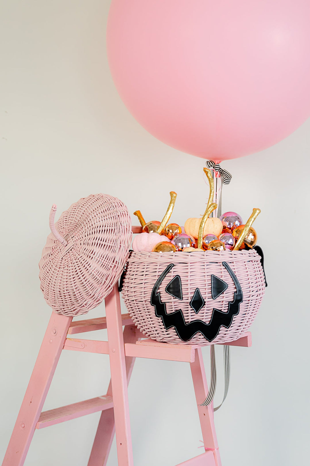 pink jack-o-lantern basket for a summerween party