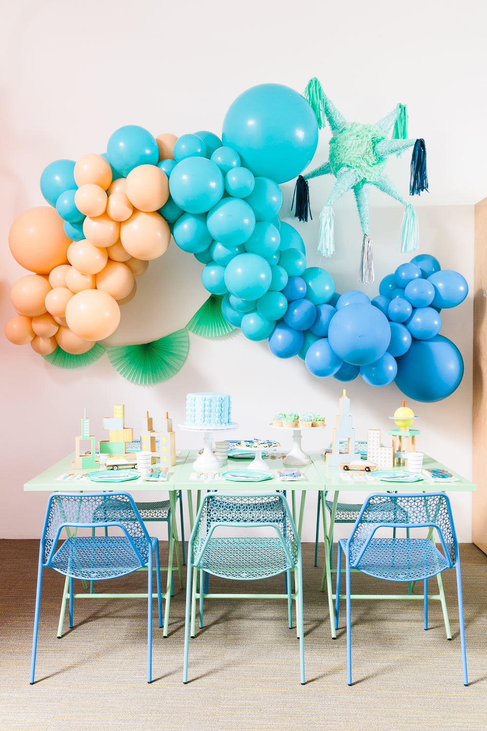Blue balloon garland with fiesta decorations - Los Angeles balloon installation