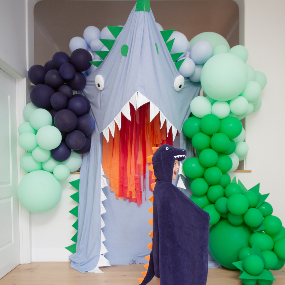Green balloon garland with shark party decorations Shark theme balloon decoration ideas- Los Angeles balloon installation