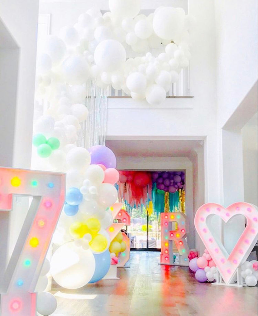 Rainbow balloon garland colorful balloon decoration ideas - Los Angeles balloon installation