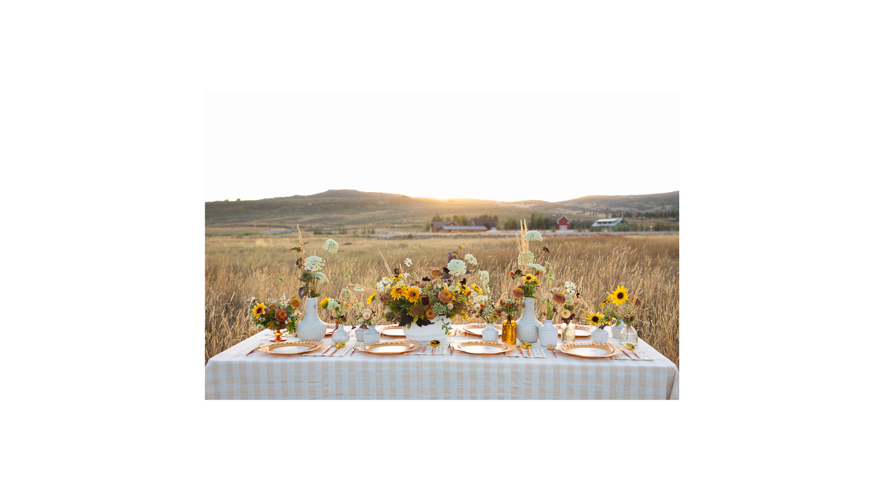 thanksgiving table setting with cozy fall decorations.