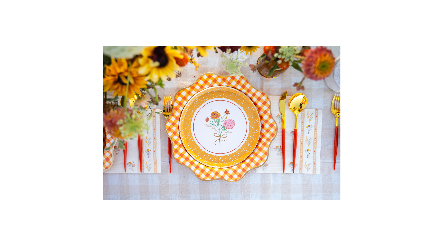 thanksgiving table setting ideas featuring plaids and florals.