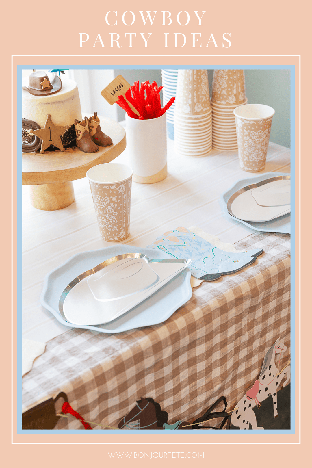 Cowboy birthday party table with tan gingham linens, cowboy hat plates, a boot and star cake, and a horse garland.