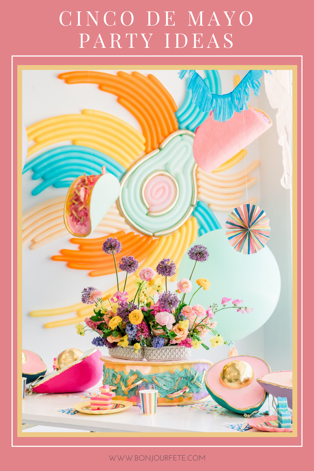 Colorful Cinco de Mayo party decorations and festive tablescape with papel picado banners