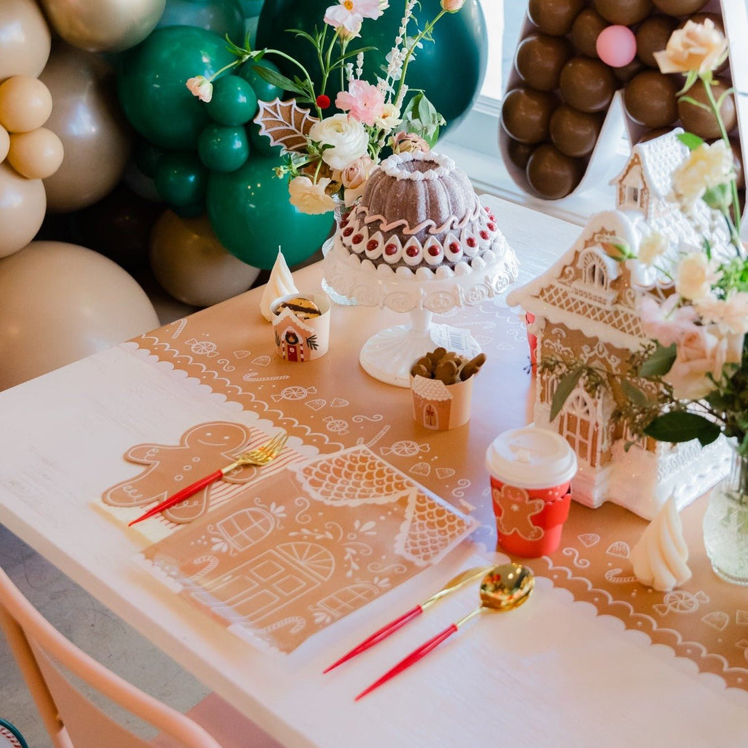 Gingerbread themed party decorations, tableware, and gifts for holiday parties