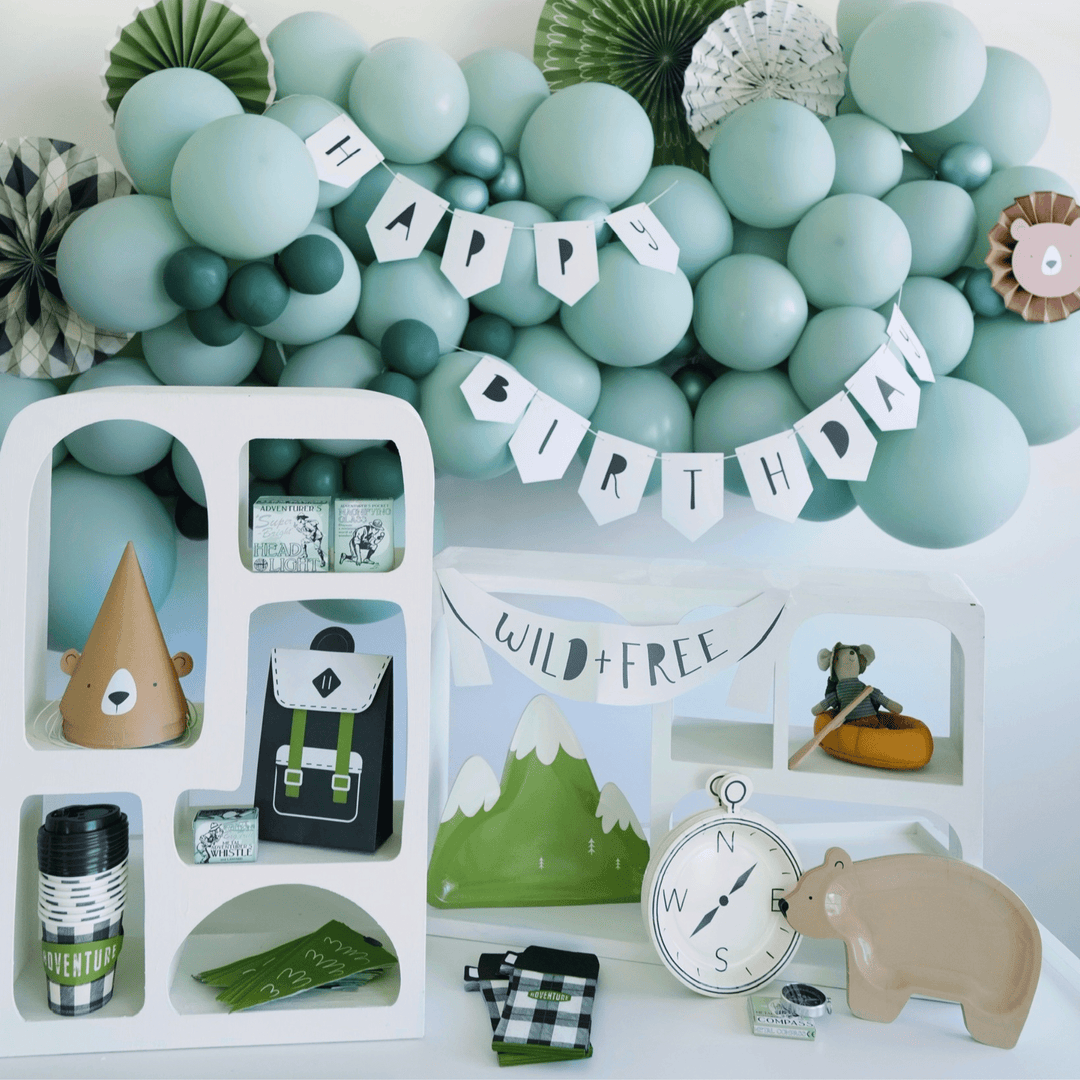 Camp theme party supplies for a camping theme birthday party.