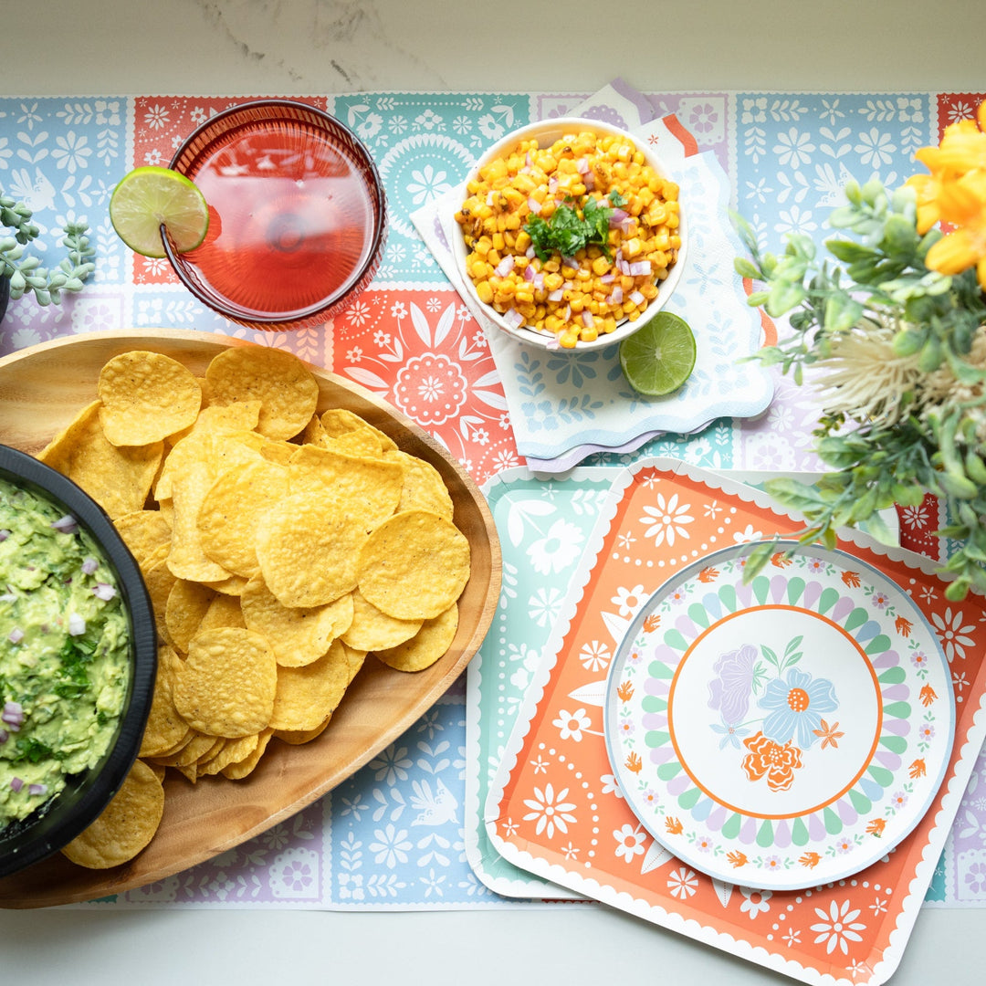 Cinco de Mayo fiesta party supplies styled on a bright festive table