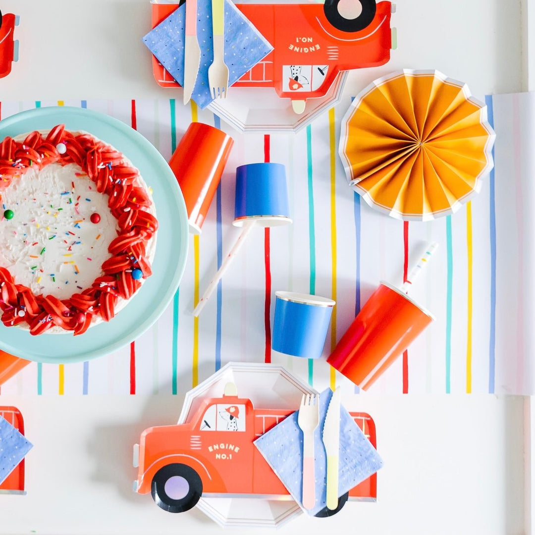 Fire truck party supplies at a firetruck birthday party.