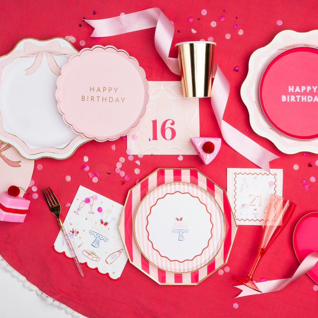 Sweet 16 party supplies with pink and hot pink decorations