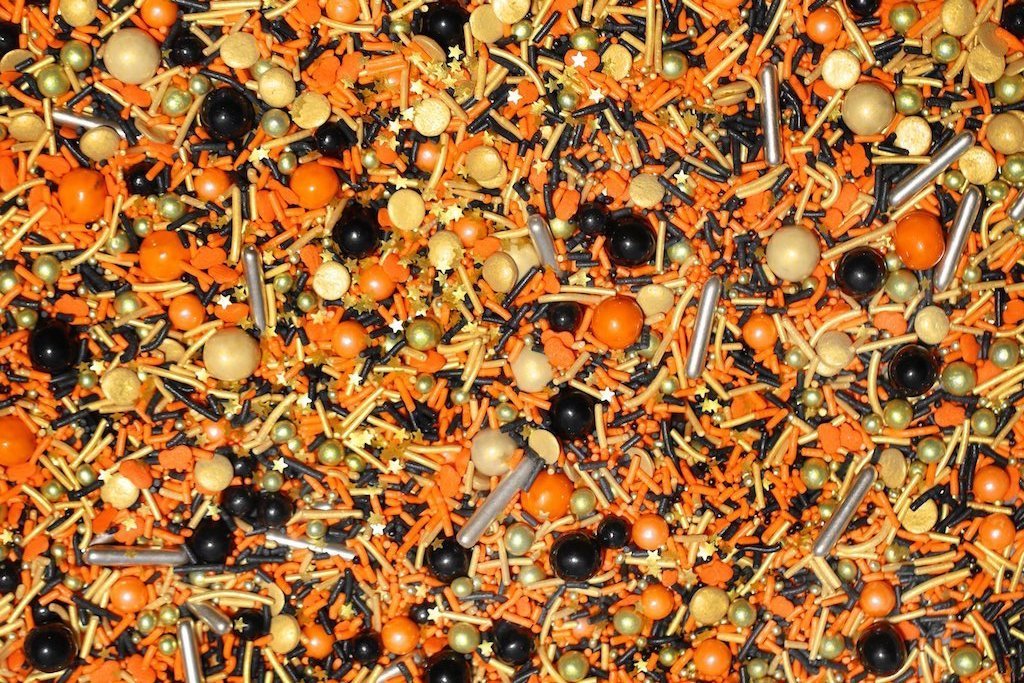 orange and black halloween themed sprinkles for cakes, treats, and cupcakes