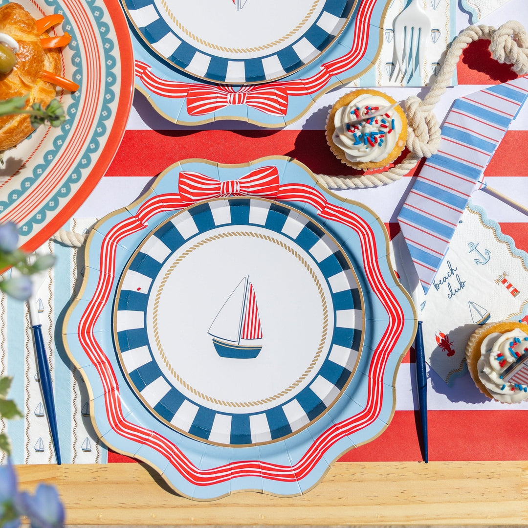 Boat paper plate on a scene with blue and red party supplies
