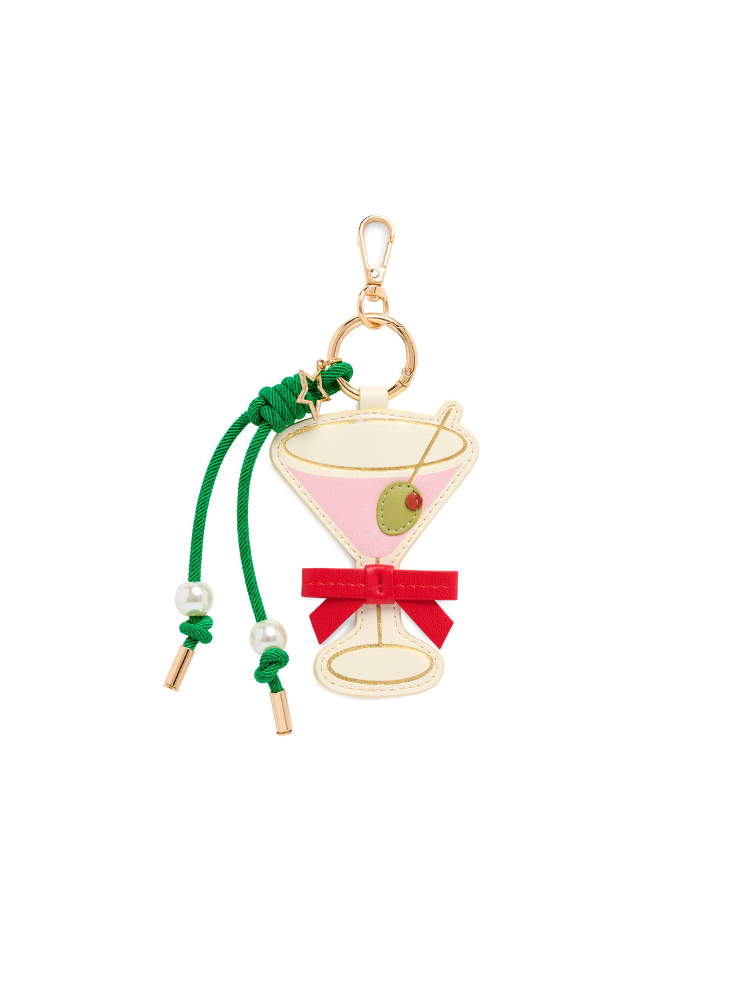 A cocktail-themed keychain charm featuring a martini glass design with a pink liquid, green cord, green olivette, and a red bow, attached to a gold clasp on a white background.