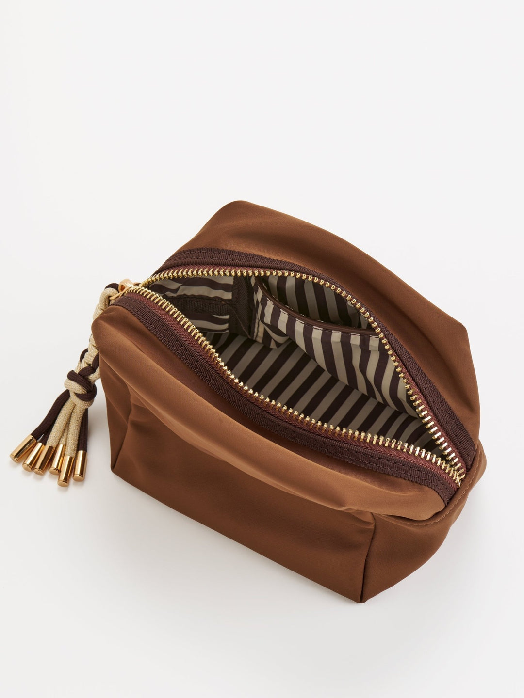 Brown cosmetic bag with striped lining on a white background