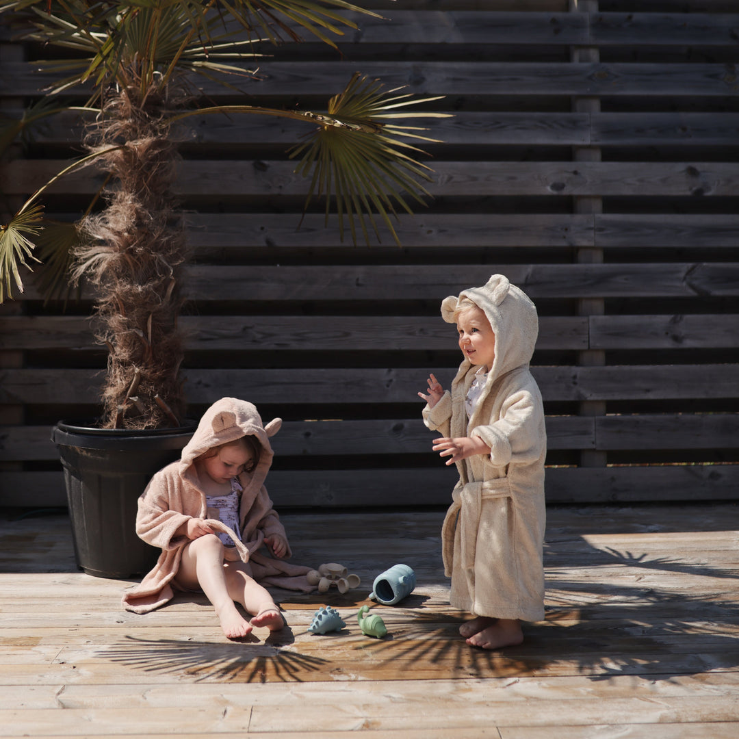 Dino Bath Essentials Kit in use — perfect dinosaur baby shower or birthday gift