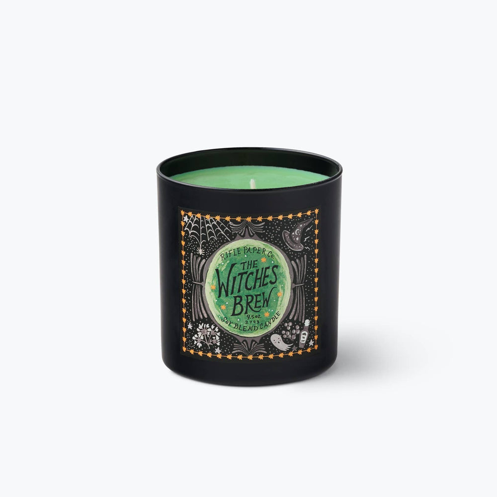 Black Witches Brew glass candle filled with green wax, a cauldron-inspired glow for Halloween nights