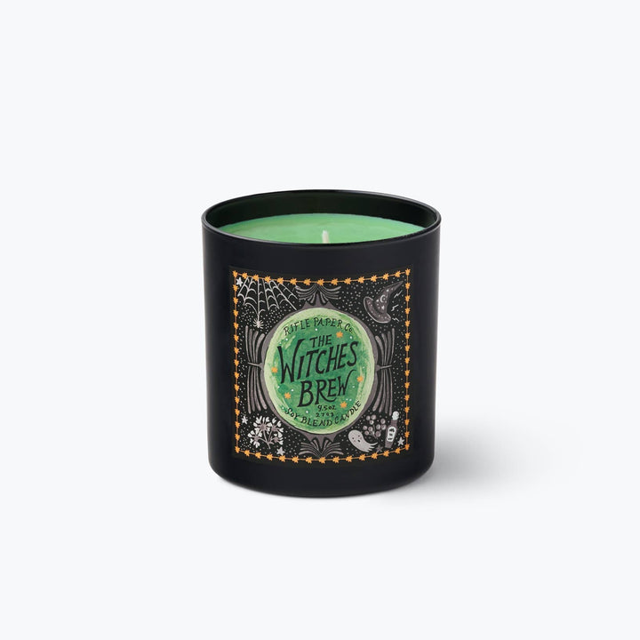 Black Witches Brew glass candle filled with green wax, a cauldron-inspired glow for Halloween nights