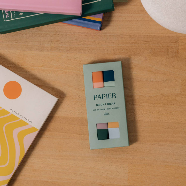 Bright Ideas highlighter set in its sage window box on a wood desk with notebooks, ready for gifting