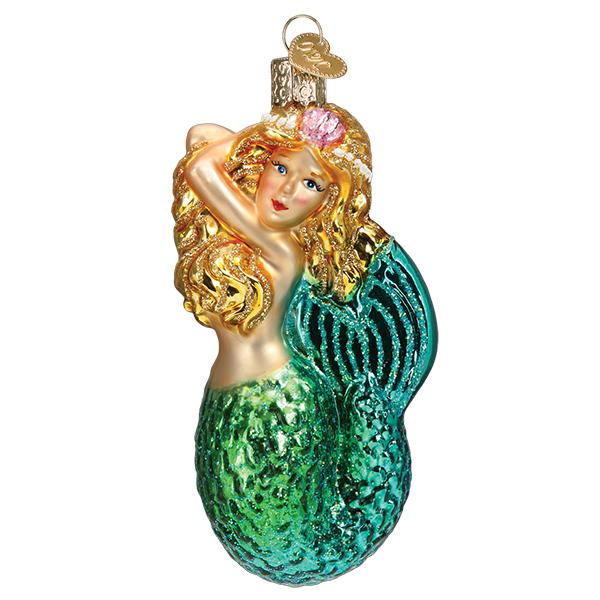 Front of the seashell mermaid glass ornament with golden hair, pink flower, and green tail, on white