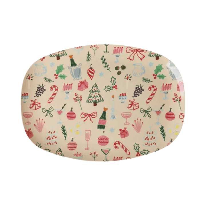Rectangular cream melamine plate in Xmas Galore print of champagne, candy canes, trees, bows, and ornaments, top view