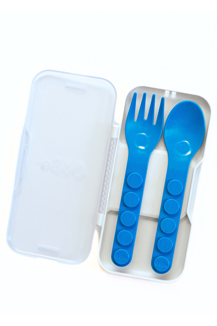 Blue fork and spoon inside the closed snap-together travel case
