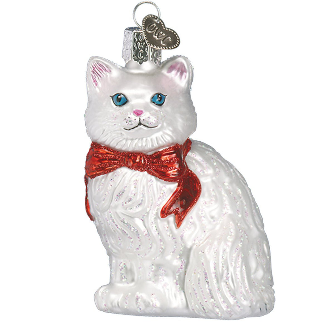 White princess cat glass ornament, front view, blue eyes, pink ears, red glitter bow, and silver cap, on white