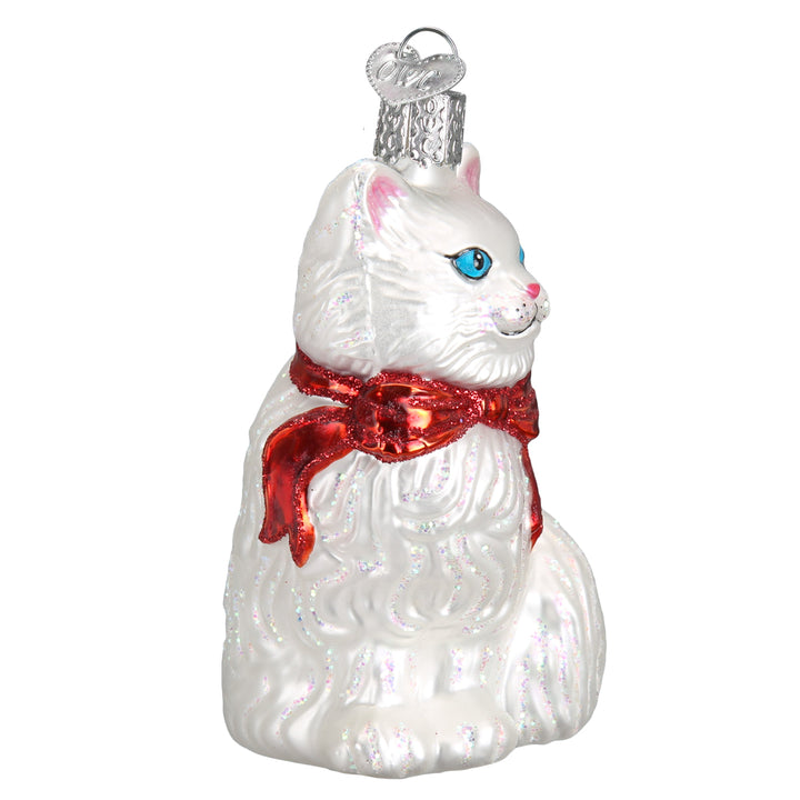 Princess Kitty ornament in side profile showing her fluffy white fur, blue eye, and red bow