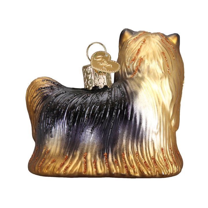 Back view of the Yorkie ornament showing its long black and tan coat