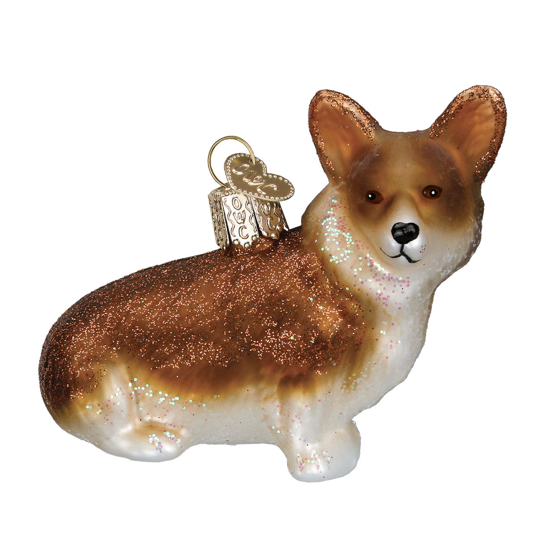 Red and white Pembroke Welsh Corgi ornament in glossy glass, three-quarter front view