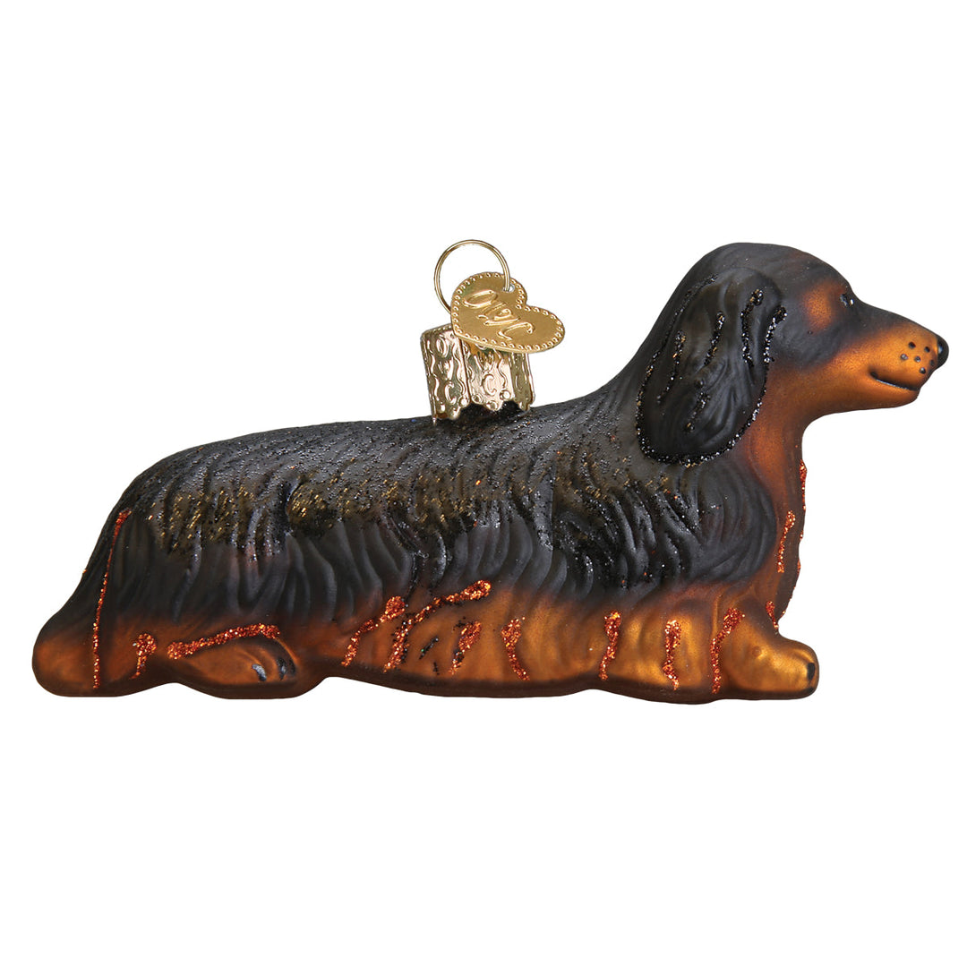 Opposite side view of the long haired dachshund ornament showing its feathered tail