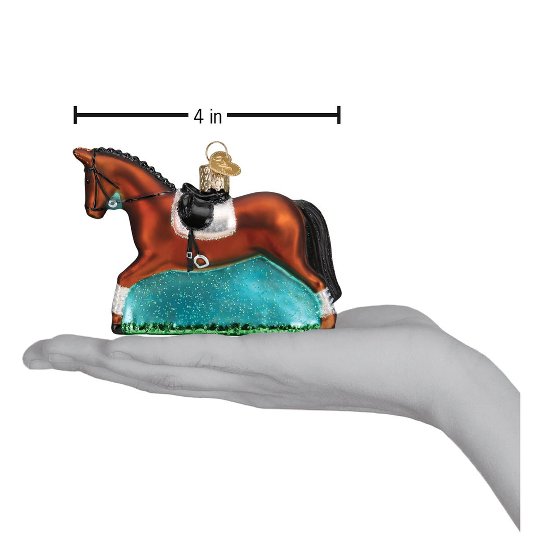 Dressage horse ornament on an open hand with a 4 inch scale marker above it