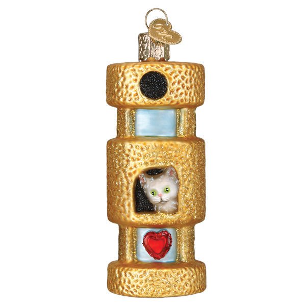 Cat tower glass ornament, front view, gold glitter tower with a white kitten in the window and a red heart, on white