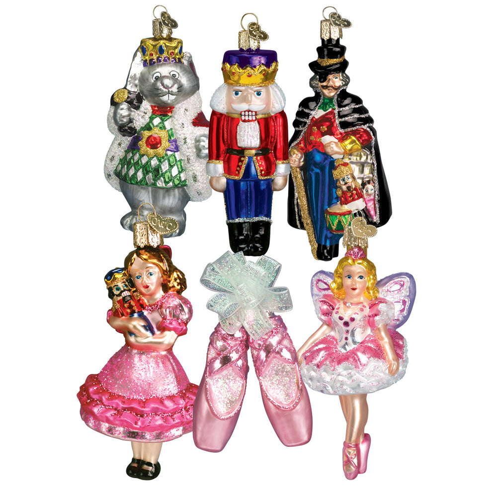 All six Nutcracker Suite ornaments grouped together: Clara, prince, fairy, Mouse King, Drosselmeyer, slippers