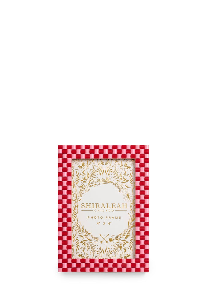 A rectangular photo frame with a red and white checkered border and a gold floral wreath design around a cream center panel. The brand name 'SHIRALEAH' is printed in gold on the center panel, which is shown against a plain white background.