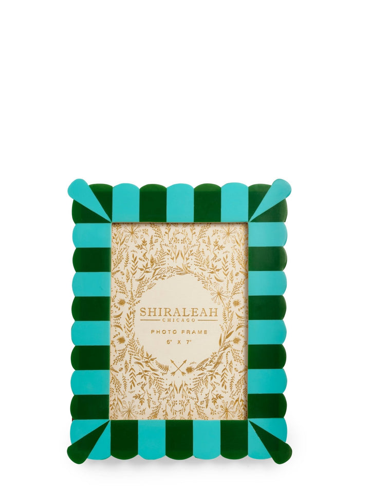 Decorative photo frame with green and blue striped design on a white background
