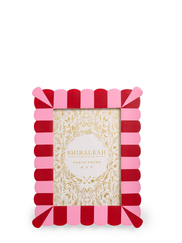 A rectangular photo frame with alternating pink and red scalloped stripes, featuring a gold-leaf patterned insert card that reads 'SHIRALEAH PHOTO FRAME'.