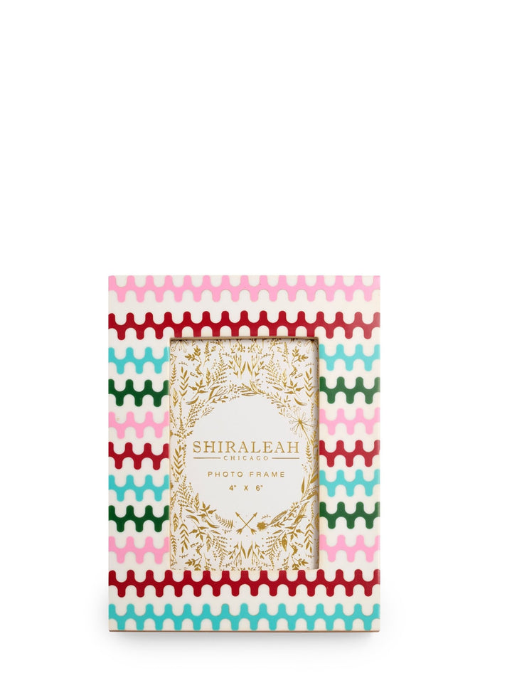 A Shiraleah Chicago 4x5 photo frame with a colorful patterned border featuring pink, teal, green, and red wavy stripes on a cream background, with a central gold-leaf ornate frame.