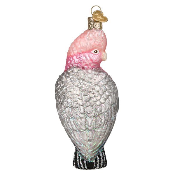 Back of the cockatoo ornament with glittered grey wing feathers and a black tail, on white