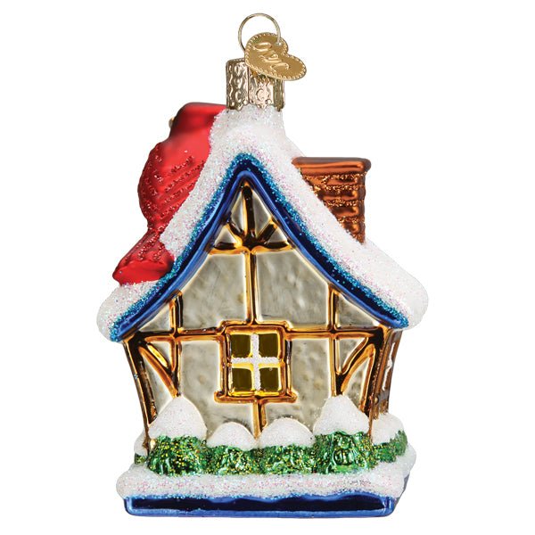 Back of the birdhouse ornament with a lit window and snowy roof, on white