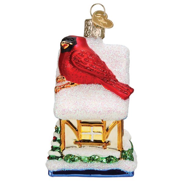 Side of the birdhouse ornament showing the red cardinal perched along the roofline