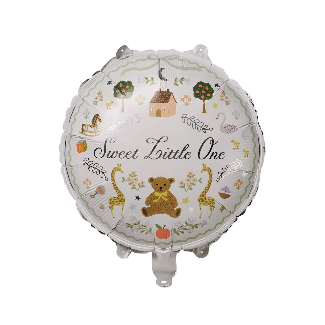 Round Sweet Little One foil balloon with teddy bear, giraffes, and nursery motifs in soft neutrals with silver accents