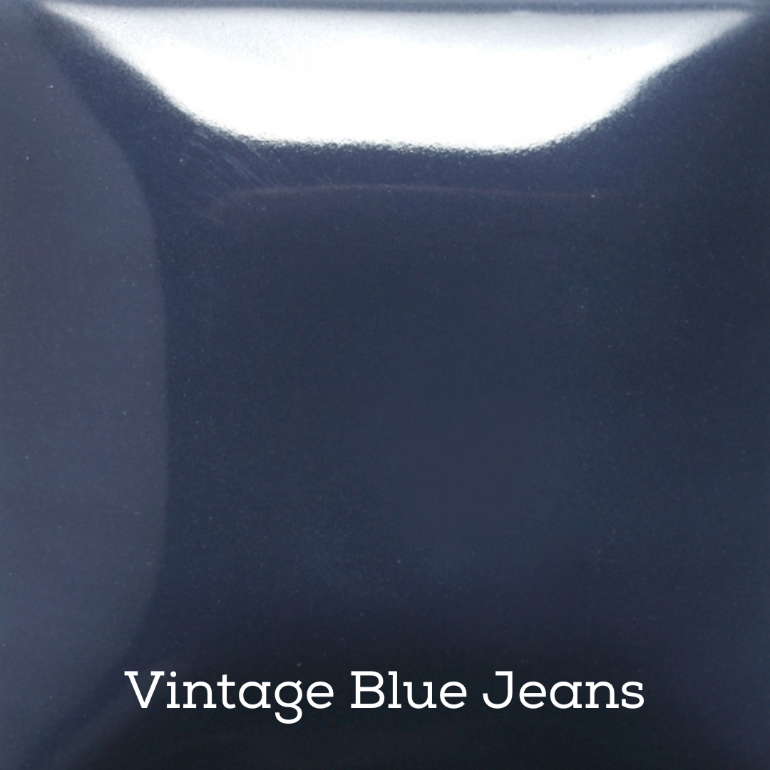 Close-up of dark blue fabric with 'Vintage Blue Jeans' text