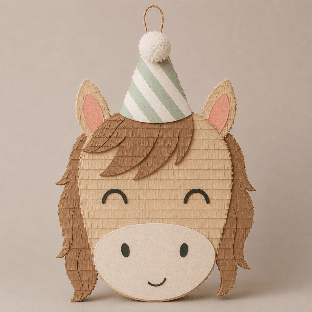 Tan pony face piñata with a fringed brown mane, pink inner ears, and a green striped party hat, for a horse birthday party