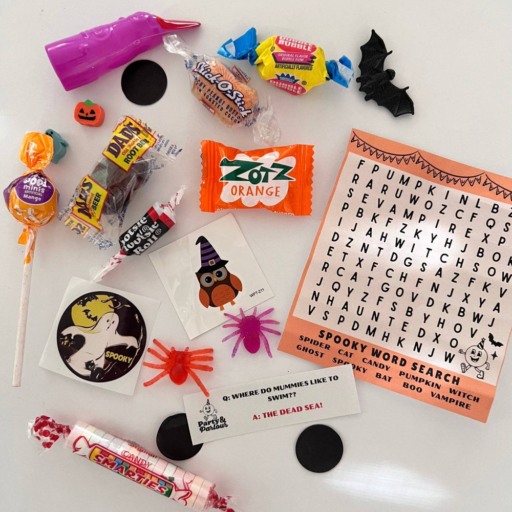 Deluxe Halloween bon bon surprises: lollipops, pumpkin ring, ghost sticker, and a mummy joke card for treat bags