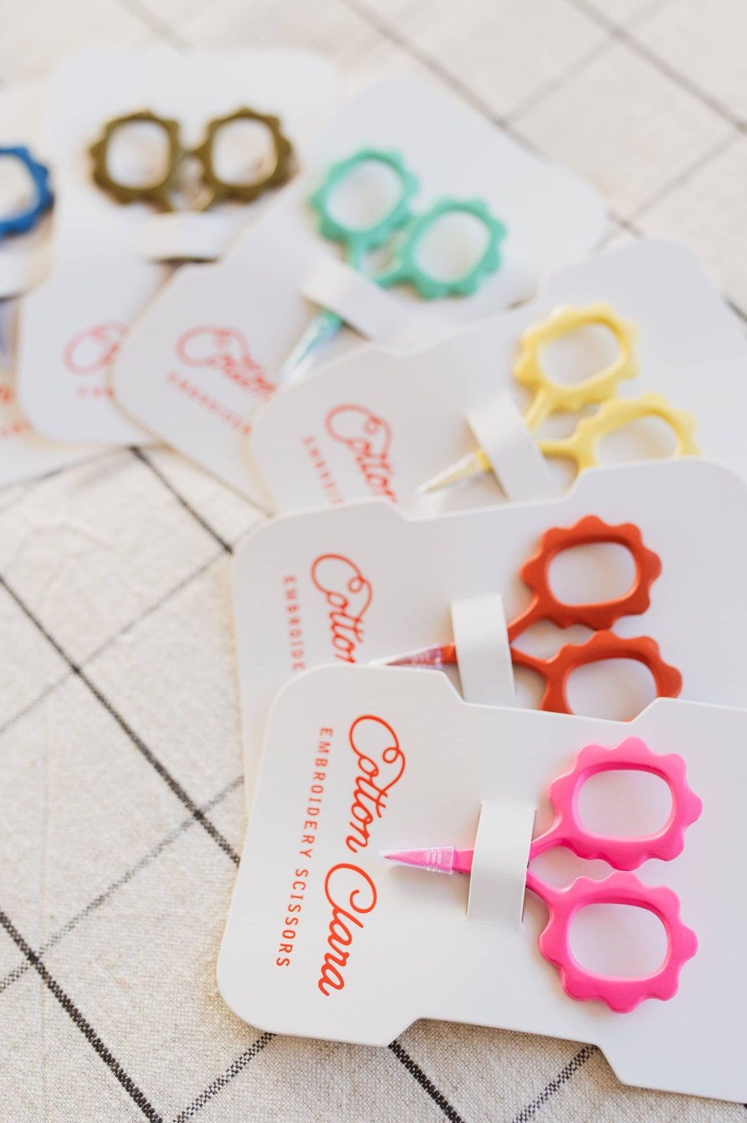 Fanned Cotton Clara embroidery scissors cards with the pink pair in front