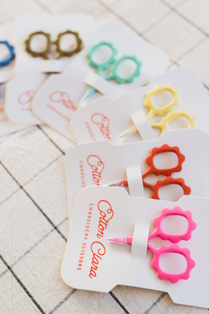 Fanned Cotton Clara embroidery scissors cards with the pink pair in front