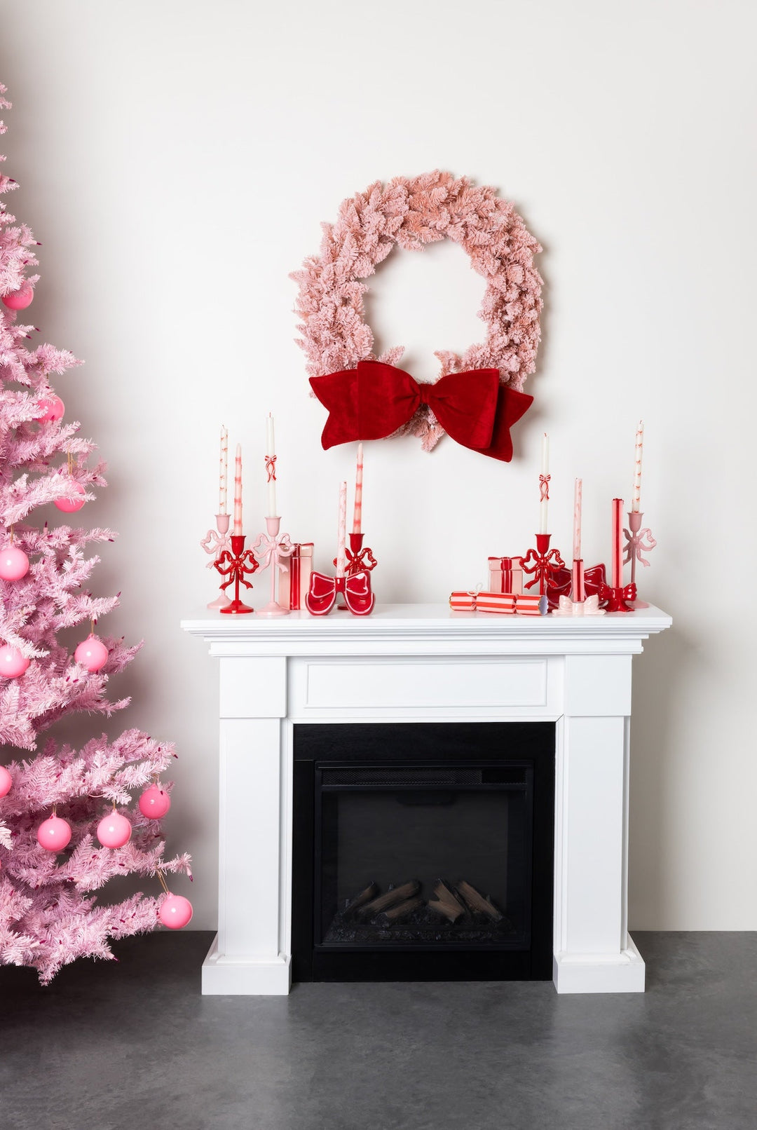 christmas bow candles for a christmas mantel decoration
