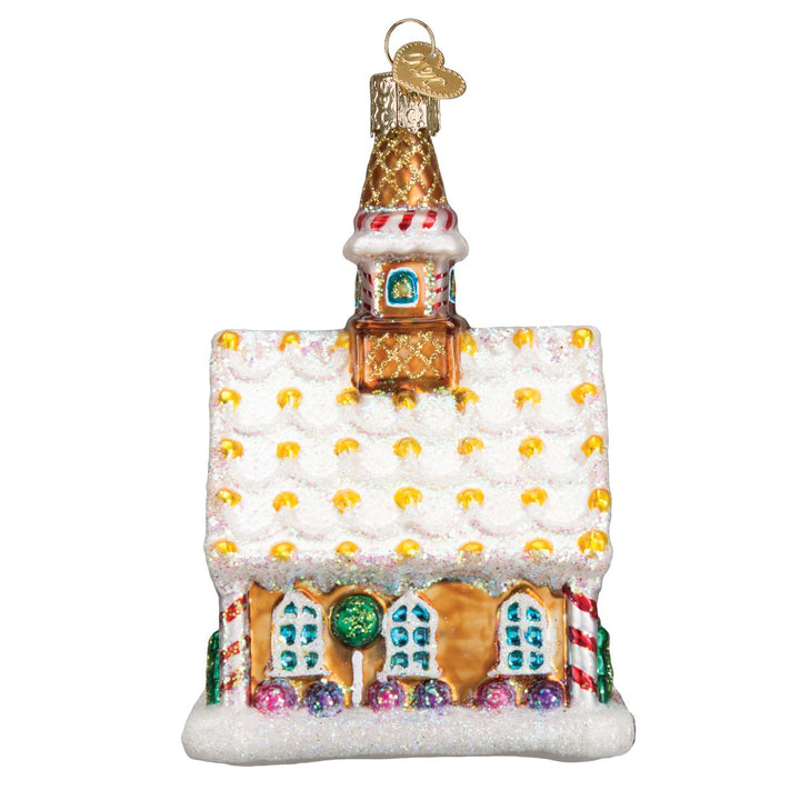 Side of the gingerbread church ornament showing yellow candy dots across the iced roof