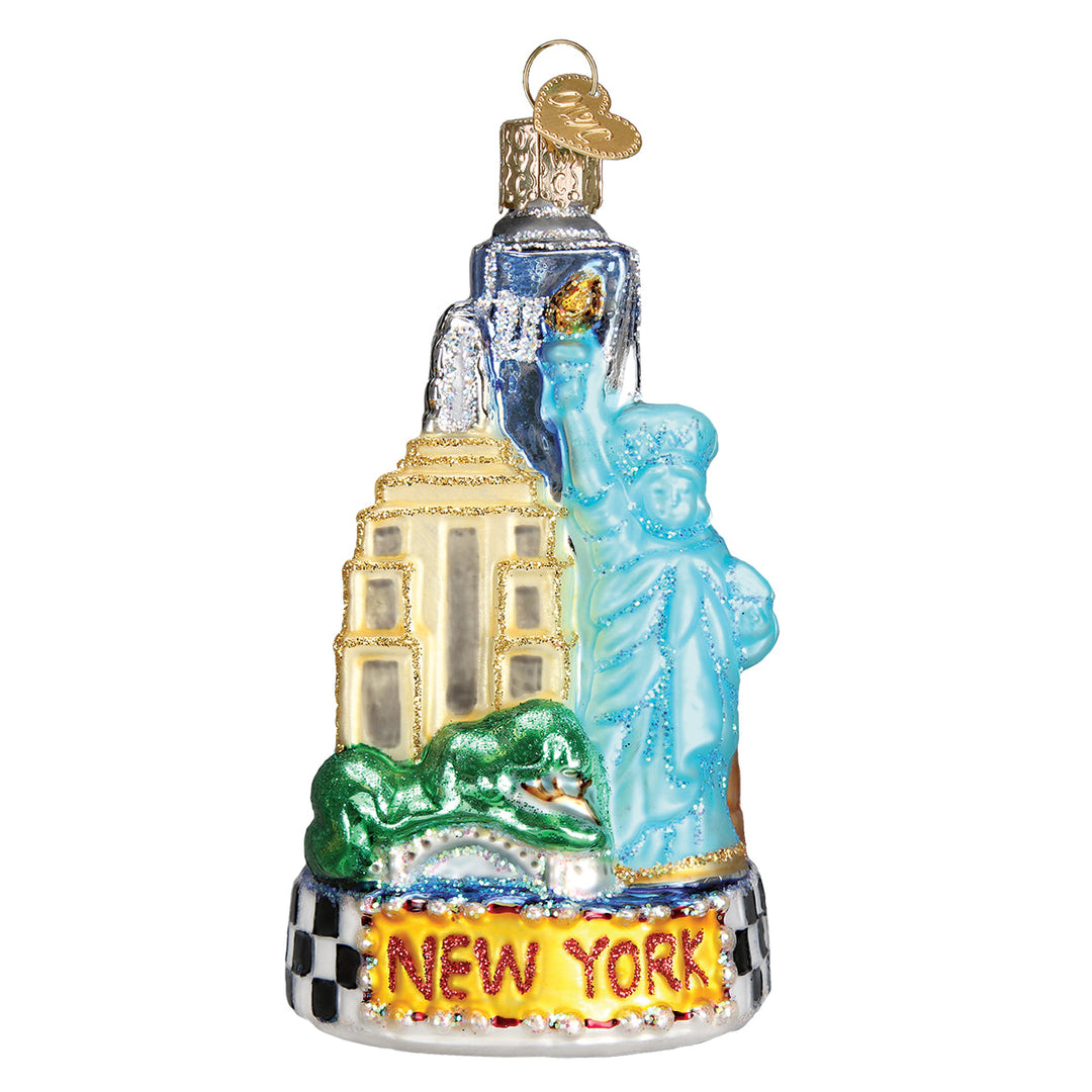 New York City glass ornament, front view, Statue of Liberty, golden skyscraper, and NEW YORK base on white