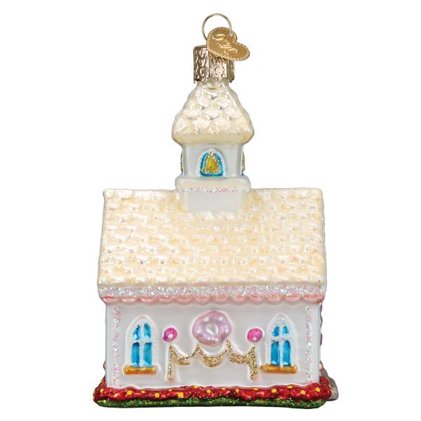Side of the wedding chapel ornament with pink swags and the glittered cream roof, on white